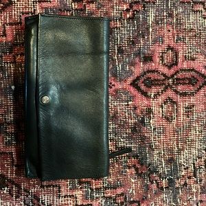 Shinola black clutch.